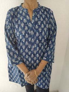 Cotton organic tunic Blue Block Print Straight Kurta Top, Cotton Kurta With Block Print And 3/4 Sleeve, Bohemian Straight Kurta Tops For Navratri, Traditional Floral Print Tunic Top, Long Sleeve Cotton Kurta With Ikat Print, Indigo Bohemian Cotton Blouse, Bohemian Indigo Cotton Blouse, Indigo Block Print Straight Kurta, Festive Tunic Tops For Navratri