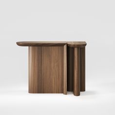 two wooden tables sitting side by side