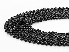 Approximately 250.00ctw 2.5-3.2mm round black spinel beads, rhodium over sterling silver woven lace necklace. Measures approximately .92"W. Magnetic clasp closure with 2" extender. Evening Jewelry With Faceted Round Beads, Elegant Black Spinel Beaded Necklaces, Tiger Eye Jewelry, Spinel Gemstone, Lace Necklace, Broken Chain, Pearl Strands, Black Spinel, Magnetic Clasp