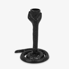 a black snake - like object on a white background