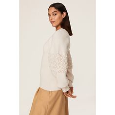 Off-white knit (64% Wool, 26% Polyamide, 9% Cashmere, 1% Elastane). Sweater. Mock neck. Long sleeves. Pull on. 24.5" from shoulder to hemline. Imported. White Pointelle Knit Top For Fall, White Ribbed Cuffs Sweater For Spring, White Sweater With Ribbed Cuffs For Spring, Cream Textured Knit Sweater For Spring, White Knit Top For Work In Winter, White Feminine Knit Top For Fall, Chic White Sweater For Spring, Feminine White Knit Top For Fall, Winter White Pointelle Knit Top For Spring