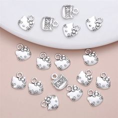 Set Of 24 Small Silver Alloy Charms. 13*10mm. Super Cute. Can Be Used For Any Kind Of Jewelry Making. Bracelets, Necklaces, Earrings. New. Never Used. Will Have A Tracking Number Through Usps. Ships From Pensacola, Fl. Like More From My Shop? Feel Free To Bundle Items Or Let Me Know What You Like, And I Can Bundle For You. Thank You For Your Interest. Sanrio Jewelry, Hello Kitty Charm, Making Bracelets, Pensacola Fl, Womens Jewelry Bracelets, Tracking Number, Hello Kitty, Charms, Let Me