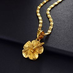 Hawaiian Flower Hibiscus Pendant Necklace Marshallese Kiribati Guam Micronesia Chuuk Pohnpei Jewelry Wedding gift .3256801201808825 The product is gold color plated or silver color plated,no real pure gold or pure silverPACKING:1pc/opp bagNO GIFT BOXJEWELRY MAINTENANCE:* If allergy exists,stop wearing.This is a fashion jewelry, not real pure gold/silver* Keep this product out of reach of small children.* Reduce to touch sweat.* Take off the jewelry while bathing,washing.* Avoid the mixing with o Flower Hibiscus, Dope Jewelry Accessories, Necklace Everyday, Hawaiian Flower, Dope Jewelry, Hawaiian Flowers, Jewelry Fashion Trends, Flower Pendant Necklace, Jewelry Lookbook