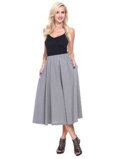 Strut or twirl with confidence in this light and breezy flared skirt. Perfect for keeping cool on a hot summer's day or for adding a touch of style whether you're off to work or a night on the town, this polyester and spandex skirt is as versatile as it is alluring. Simply hand wash your skirt to keep it looking new longer. Light Blue Skirts, Flared Midi Skirt, Floral Print Midi Skirt, Midi Skirt With Pockets, Style Inspiration Casual, Midi Flare Skirt, Printed Midi Skirt, Skirt With Pockets, Mid Length Skirts