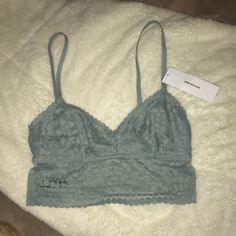 Bra(Lette) From Urban Outfitters Out From Under Brand Seafoam Green/Blue Adjustable Straps Size M Has Some Stretch Nwt Make An Offer!!! Blue Lace Camisole For Spring, Spring Camisole Bra For Loungewear, Spring Loungewear Camisole Bra, Urban Outfitters Spring Tops Bra Friendly, Blue Lace Trim Bra For Summer, Casual Blue Fitted Bra, Longline Bra, Seafoam Green, Long A Line