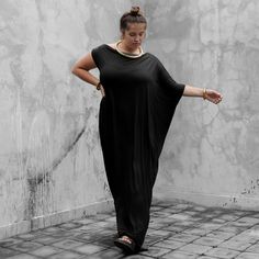 "Luxuriously soft black off the shoulder kaftan. This effortless maxi dress has been our best seller since we launched it and it is easy to see why. Check the raving reviews! Made from super eco textile bamboo jersey and drapes like a dream making it so versatile - wear it for a formal night out, or lounge at home in it. The perfect mother's day gift! Bamboo jersey is easy to care for - machine wash cold and line dry. You will never want to take this off. Perfect for the beach, amazing over legg Black Batwing Sleeve Evening Dress, Black Evening Dress With Batwing Sleeves, Evening Maxi Dress With Batwing Sleeves, Oversized Black Evening Dress, Elegant Oversized Evening Maxi Dress, Elegant Oversized Maxi Dress For Evening, Oversized Maxi Dress For Evening, Eco Textile, Black Kaftan