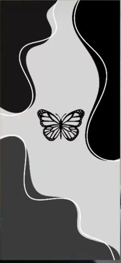 a black and white photo with a butterfly on it's back side, in the middle