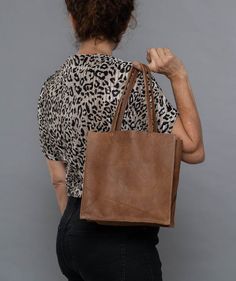 Check out other colors of this bag style here:https://www.etsy.com/shop/bags1and1stuff?ref=hdr_shop_menu&section_id=15504059A small leather tote to use when going out, this is what makes this bag worth purchasing for your own use. This simple leather tote is made out of leather and is sure to suit the outfit you'll be wearing for the party or any special occasion you'll be attending. Though it is small in size, this small black bag is sure to maximize your look as it is able to give the best Square Box Bag With Leather Handles For Everyday, Everyday Square Box Bag With Leather Handles, Square Hobo Bag With Removable Pouch For Everyday, Brown Box Bag With Removable Pouch For Everyday, Everyday Square Hobo Bag With Removable Pouch, Everyday Brown Box Bag With Removable Pouch, Brown Everyday Box Bag With Double Handle, Everyday Square Brown Shoulder Bag, Everyday Brown Square Shoulder Bag