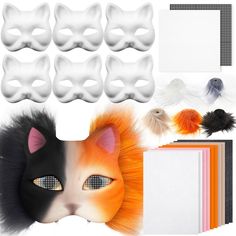 a cat mask with many different colored feathers and other items to make it look like an animal