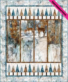 a quilt with two deers in the snow and trees on it's sides