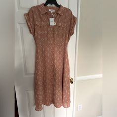 Nwt Lucky Brand Midi Shirt-Dress: Pinky Beige, White Geometrical Print, Front Pockets, Collar, Sleeveless, Lined. Fabric: 100% Polyester. Size Medium. Measurements: Pit To Pit 20 In, Waist 15 In, Length 46 In. Fitted Short Sleeve Rayon Shirt Dress, Fitted Rayon Shirt Dress With Short Sleeves, Casual Collared Rayon Dress, Fitted Collared Rayon Dress, Beige Button-up Shirt Dress With Placket, Midi Shirt Dress, Lucky Brand, Dress Brands, Geometric Print