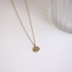 "Personalized Message Necklace, Round Circle Pendant Necklace, 14K Solid Gold Necklace, Engraving Name Necklace, Personalized Gifts for Her ≫ Product Details ◈ Handmade / Handcrafted Fine Jewelry ◈ Pendant Size: 8mm ◈ Thickness: 1.80mm ◈ Metal: Solid 14K Gold ◈ Gold Color: White gold, Rose gold, Yellow gold ◈ Chain Length: 14\" ~ 22\" ≫ Please read our FAQ below for more detail." Gold Sterling Silver Fine Jewelry Necklaces, Dainty 14k Gold Round Pendant Necklace, Dainty Yellow Gold Pendant Necklace, Yellow Gold Plated Round Pendant Necklace, Yellow Gold Brass Necklace With Round Pendant, Yellow Gold-plated Round Pendant Necklace, Tarnish Resistant Brass Wedding Necklace, Gold Dainty Round Pendant Custom Necklace, Dainty Gold Custom Necklace With Round Pendant