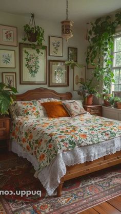 a bed sitting in the middle of a bedroom with lots of plants on the wall