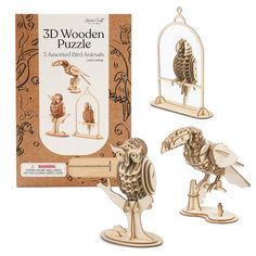 the 3d wooden puzzle is set up to look like an animal in a birdcage