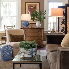 a living room filled with furniture and decor