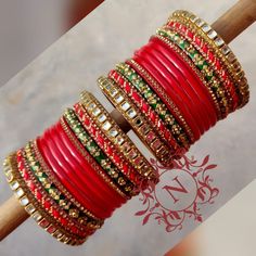 Traditional Beaded Bangle For Wedding, Red Bangle Jewelry For Marriage, Red Bangle For Marriage, Beaded Bangle For Wedding And Festive Occasions, Traditional Wedding Beaded Bangle, Festive Beaded Wedding Bangle, Festive Wedding Beaded Bangle, Red Bollywood Bangle For Party, Bollywood Style Red Party Bangle