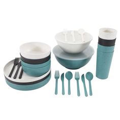 a set of dinnerware with forks and spoons