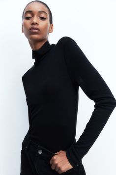 Fitted  turtleneck top in ribbed jersey made from a modal and cotton blend. Long sleeves and a straight-cut hem. Black Ribbed Turtleneck Top, Black Knit Sweater Turtlenck, Black High Neck Ribbed Turtleneck, Black Ribbed Fitted Turtleneck, Black High Neck Turtleneck With Ribbed Collar, Black High Neck Cashmere Top, Active Swimwear, Sportswear Trends, H&m Shoes