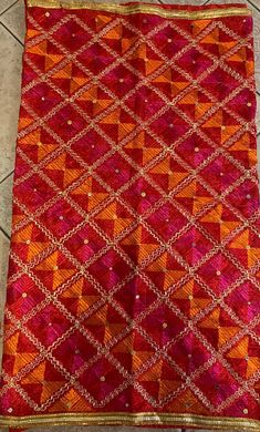 Mothers day gift orange pink colour Phulkari Dupatta for women | Phulkari also called Indian Dupatta | Used as Dupatta Stole  Phulkari is traditional artwork of Embroidery indigenous to Punjab region of India. Punjabi women traditionally created it with hand over many days to gift/wear on occasions. This heritage of Punjab is preserved in our Phulkari Dupatta. Hope you have a glimpse of this rich heritage through our Dupattas.  Our feather-soft threads have the lustre that will add a distinct sparkle to your look. Be it your traditional outfit or a modern ensemble, a phulkari dupatta can never go wrong in adding its appeal to your elegance. These timeless pieces will always stay as your prized possessions.  Light Phulkari Dupatta for Women with Full Hand Work All Over It Premium Multi Colo Affordable Multicolor Dupatta For Celebrations, Orange Chanderi Traditional Wear With Dori Work, Orange Chanderi Salwar Kameez With Dori Work, Orange Traditional Wear With Mirror Work For Eid, Festive Embroidered Orange Saree, Festive Orange Embroidered Saree, Diwali Orange Embroidered Fabric With Zari Work, Orange Embroidered Saree Fabric For Festive Season, Orange Mirror Work Dupatta For Eid