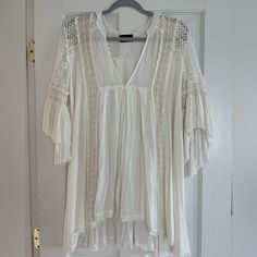 Never Worn, Off-White Crochet Lace Tunic. Great For A Beach Coverup Or To Be Worn With Shorts Or Jeans. I Am 5’3” And It Was Too Short To Be Worn Alone As A Dress White Crochet Top With Lace Sleeves For Spring, White Lace Crochet Top With V-neck, White Lace Crochet V-neck Top, White Lace V-neck Crochet Top, White Summer Crochet Top With Lace Trim, White Crochet Top With Lace Trim For Summer, White Crochet Top With Lace Trim For Brunch, White V-neck Crochet Top For Brunch, White Lace Trim Crochet Summer Top