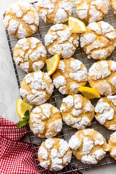 lemon and powdered sugar cookies on a cooling rack