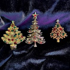 Christmas Brooches Vintage/ Monet Nib Monet Snowman Brooch Never Used 3 Vintage Christmas Tree Brooches Colored Rhinestones 3 Roll Over Closures All Working I Tac Pin No Stones Missing 1 New In Box (Monet) Costume Jewelry All In New And/Or Gently Used Condition See Photos Smoke Free & Pet Free Home Christmas Brooches, Monet Jewelry, Vintage Monet, Vintage Christmas Tree, Vintage Brooches, Costume Jewelry, See Photo, Vintage Christmas, Brooches