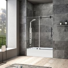 a bathroom with a walk in shower next to a bath tub