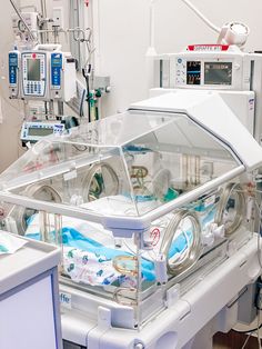 a hospital room filled with lots of medical equipment