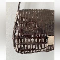 Beautiful Vintage Made In Italy Moschino Bag. 13”X 9”. Very Light. Patent Application In Purple Color. Scratches On Hardware. Designer Formal Rectangular Shoulder Bag, Formal Designer Rectangular Shoulder Bag, Designer Square Shoulder Bag With Silver-tone Hardware, Designer Square Flap Bag For Formal Occasions, Designer Brown Flap Bag For Formal Occasions, Designer Formal Tote Flap Bag, Formal Brown Textured Leather Flap Bag, Formal Tan Textured Leather Bag, Luxury Square Shoulder Bag With Silver-tone Hardware