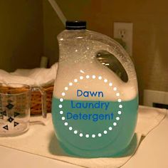 a gallon of laundry deterant sitting on top of a counter