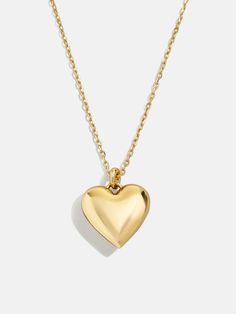 Design a special memento to represent those closest to your heart. The Puffy Heart 18K Gold Custom Pendant Necklace features a three-dimensional heart charm with the option to add 1-4 engraved letters of your choosing. Add the initials of each of the members of your family, you and a few loved ones, or even just your own - the options are endless. Better yet, this piece is crafted with 18K gold plated sterling silver, meaning it'll last you a lifetime. Silver Meaning, Heart Gold Necklace, Heirloom Necklace, Engraved Letters, Silver Braided Ring, Custom Pendant Necklace, Initial Jewelry Necklace, Puffy Heart Necklace, Heart Pendant Necklace Gold