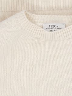 Studio Nicholson 'Hemyl' basic sweater in cream wool with crew neck, dropped shoulders, ribbed trims, straight hem. Composition: 100% Lamb Wool Ultimate Capsule Wardrobe, Basic Sweater, Chloe Purses, Studio Nicholson, John Lobb, Basic Sweaters, Zegna Shoes, Burberry Hat, Engineered Garments