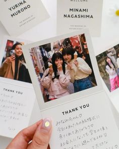 a person holding up a card with photos on it and the words thank you written in japanese