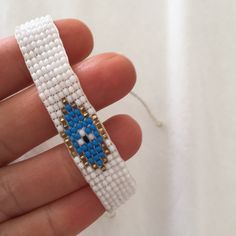 Brand New Never Worn, Bought At A Vacation Gift Shop. It Is Adjustable. Super Cute! White Evil Eye Beaded Bracelets For Festivals, White Evil Eye Bracelets For Festival, Festival White Evil Eye Bracelets, White Bracelet, White Bracelets, Womens Jewelry Bracelets, Evil Eye, Gift Shop, White Blue