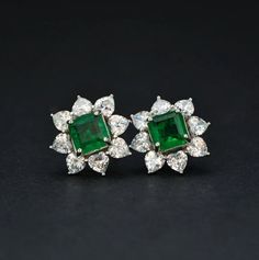 Welcome to Elegant Art Jewelry!  Material: 925 Sterling Silver Stone: Lab Emerald Stone Size: 7mmx7mm Side Stone: Zircoin Stone Cut: Square cut Personalization: 9K/14K/24K/GOLD/SILVER/PLATINUM/ROSE-GOLD/WHITE GOLD. (Contact me)  Emerald Earrings, Emerald Cuff Earrings, Gold Earrings, Gold Stud Earrings, 14k Gold Earrings, 14k Gold Earrings, Round Cut Earrings, Round Cut Stone Earrings, Round Cut Studs Earrings, Emerald Drop Earrings, Emerald Studs Earrings, Emerald Studs, Emerald Earrings, Emera Luxury Emerald Earrings For Formal Occasions, Luxury Green Earrings For Gift, Luxury Emerald Earrings As A Gift, Luxury Traditional Emerald Earrings, Luxury Temple Jewelry Emerald Earrings, Luxury Emerald Diamond Gemstone Earrings, Luxury Emerald Earrings For Gift, Luxury Emerald Temple Jewelry Earrings, Emerald Green Earrings Zales