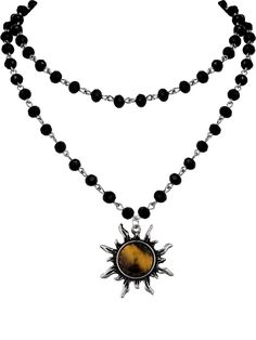 PRICES MAY VARY. GOTH Y2K BOHO TIGER EYE SUN CHOKER NECKLACE: The sun is a symbol of warmth, light, and life, representing energy, vitality, and creativity. It can also symbolize growth, strength, and power. With its elegant design and versatile style, this sun necklace is sure to be a cherished addition to any jewelry collection. MATERIALS: Meticulously crafted from high-quality zinc alloy, onyx and nature crystal SIZE & LENGTH: The Tiger Eye Sun Pendant measures 1.37 inches in diameter. The fi New Year Jewelry, Beaded Boho Necklace, Goth Choker, Bead Choker Necklace, Goth Necklace, Necklace Gothic, Sun Necklace, Style Gothic, Sun Pendant