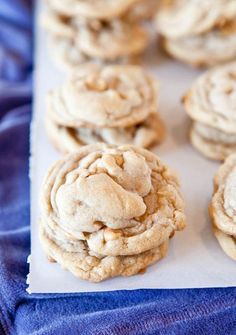 some cookies are sitting on a blue cloth