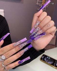 Purple And Gold Bling Nails, Purple And Black Birthday Nails, Nails Acrylic Crystal, Purple Long Nails Designs, Dark Purple Birthday Nails, Long Extra Nails, Pink Crystal Nails, Dope Nail Designs Purple, Purple Bling Nails