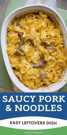 a casserole dish with sausage, pork and noodles in it on a table