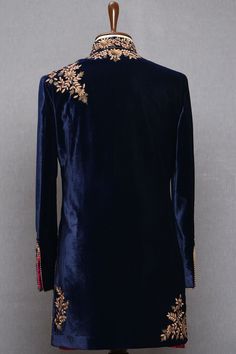 Blue Color Hand Embroidered Indo Western Jacket Fitted Bandhgala With Resham Embroidery And Long Sleeves, Designer Blue Nehru Jacket With Intricate Embroidery, Elegant Blue Designer Outerwear, Designer Embroidered Fitted Bandhgala, Blue Floral Embroidered Bandhgala For Designer Wear, Fitted Bandhgala With Floral Embroidery In Traditional Drape, Designer Embroidered Blue Traditional Wear, Designer Embroidered Fitted Nehru Jacket, Designer Fitted Embroidered Nehru Jacket