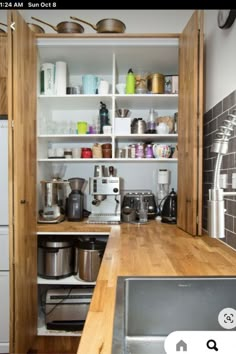 the kitchen is clean and ready to be used as a storage area for cooking utensils