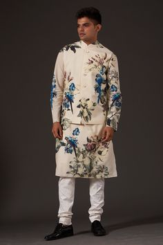 Ivory bundi with bird, floral printed motifs and front buttons.
Components:1
Pattern:Printed
Type of Work:Floral,Bird
Neckline:Band
Sleeve Length:Sleeveless
Fabric:Linen
Color:White
Other Details:
Note: Pant and inner kurta worn by the model is not for sale
Occasion:Destination Wedding - Aza Fashions Kurta Set For Men, Rohit Bal, Anita Dongre, Tarun Tahiliani, Nehru Jackets, Manish, Churidar, Kurta Set, Green Fabric