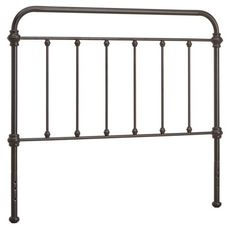 a metal headboard with four posts and an iron design on the top, against a white background