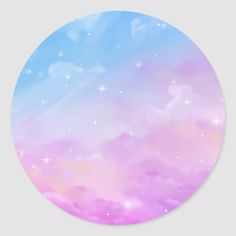 a round sticker with pastel clouds and stars in the sky