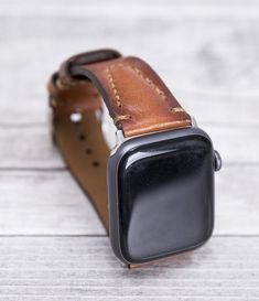 Genuine leather brown sport Apple watch strap for series 1-6 & SE. This watch strap is medium size and fits 150-190mm wrists. Seven different color options for adapters (Silver, Black, Space Gray, Rose Gold, Yellow Gold, Red and Blue). Adapter color and buckle color will be same. Shipping: Shipping within US takes usually 3 business days via USPS/FedEx, to Europe 1 business day via TNT Express. We normally send the orders in 1 or 2 business days. Customization: We can write messages, names, Leather Anniversary, Band Fits, Apple Watch Bands Leather, Apple Watch Strap, Apple Watch Band, Apple Watch Series, Leather Items, Leather Material, Watch Strap