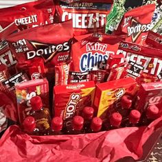 a red bag filled with chips and snacks