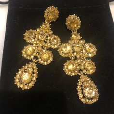 Sparkles Galore. These Dazzlers Have A Soft But Brilliant Golden Sparkle That Is Sophisticate And Red Carpet Glamorous. 2 1/4 Zo Surgical Steel Posts Gift Boxed From Our Boutique Gold Glamorous Chandelier Earrings For Formal Occasions, Glamorous Gold Chandelier Earrings For Formal Events, Elegant Yellow Clip-on Earrings, Glamorous Gold Clip-on Earrings For Party, Glamorous Gold Bridal Earrings For Evening, Gold Bridal Earrings For Party, Glamorous Clip-on Bridal Earrings For Party, Glamorous Party Bridal Clip-on Earrings, Glamorous Clip-on Chandelier Earrings For Party