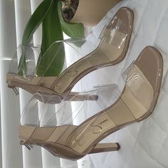 Clear Strappy Upper And A Slender Heel Faux Leather Back Zipper Closure Almond Open Toe Aprox 3.75" Stiletto Heel Nwob Never Worn Synthetic Closed Toe Heels With Clear Strap, Synthetic Heels With Clear Strap And Closed Toe, Synthetic Open Toe Heels With Clear Strap, Formal Heels With Clear Strap And Synthetic Material, Formal Heels With Clear Strap, Chic Heels With Clear Strap And Round Toe, Chic Heels With Clear Strap And High Heel, Chic Open Toe Heels With Clear Strap, Chic High Heels With Clear Strap