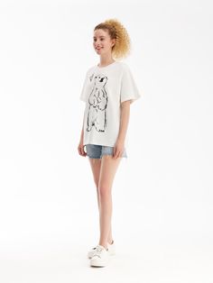 Details: The classic, versatile and cute Bear Sketch T-Shirt.The Greenland animal representative polar bear on the chest is presented in the form of sketch print, which is cute and soft.The diamonds on the chest make it a perfect fit.Contoured, off-the-shoulder fit Materials & Care: Cotton 73.4 %Viscose 26.6% Hand wash | Dry clean Do not bleach Size & Fit: Model is 5'7", Bust 32, Waist 24, Hips 35, wearing a size S Item #: JN2TE16 White Short Sleeve Top With Bear Print, White Cotton Tops With Bear Print, White Crew Neck T-shirt With Bear Print, Cotton Tops With Bear Print And Relaxed Fit, White Bear Design Short Sleeve Tops, Casual Bear Design Crew Neck Top, Casual White T-shirt With Bear Design, Casual White T-shirt With Bear Print, White Short Sleeve Top With Bear Design