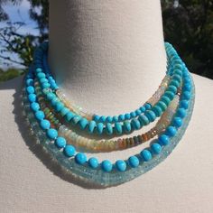 "Neck candy, anyone? Absolutely gorgeous beaded necklaces to add to your layering game! Pictures just don't do justice how sparkly and beautiful these beads are! Please choose from: 1. Aquamarine 4.5-7mm, 19\" plus extender 2. Ethiopian opal 5-6mm, 16\" plus extender 3. Kingman turquoise 4mm, Ethiopian opal, 4 pave diamond rondelles, 16\" plus extender All necklaces are finished with 14k gold clasp and extender chain. Check OliverRafCollection for new listings: https://www.etsy.com/shop/OliverRa Turquoise Crystal Necklaces With Gemstone Beads, Turquoise Multi-strand Gemstone Necklaces, Turquoise Multi-strand Gemstone Necklace, Turquoise Gemstone Multi-strand Necklace, Turquoise Rondelle Beaded Gemstone Necklaces, Turquoise Gemstone Beads Crystal Necklace, Turquoise Beaded Necklace With Round Gemstone Beads, Spiritual Turquoise Crystal Necklaces With Faceted Beads, Spiritual Turquoise Crystal Necklace With Faceted Beads